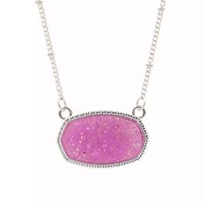 Rose Pink Drusy in an hexagonal/oval shape pendent on a Silver Toned Chain.